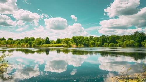 Summer Cloudy Sky Above Summer River Landscape Lake