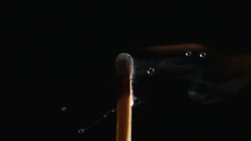 Close Up of a Match Burning Slowly