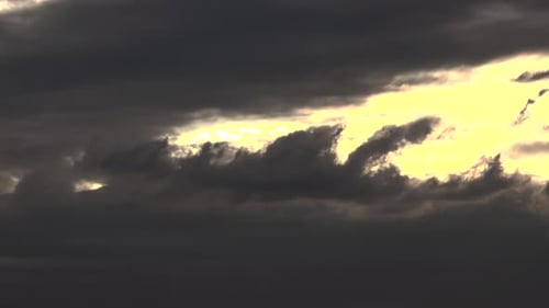 Dramatic Sky with Dark Clouds and Golden Light
