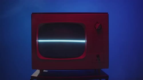 Vintage Red Television with Static on Blue Background