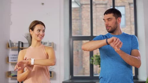 Happy Couple Exercising at Home