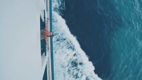 Woman Enjoying a Cruise in the Summer Sun