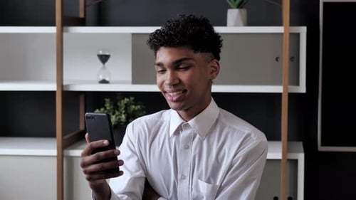 Young Adult Using a Smartphone for Video Call