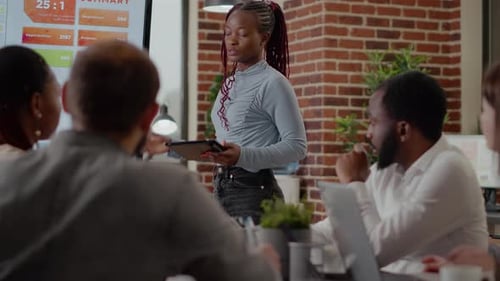 Close Up of Employee with Tablet Presenting Business Analysis