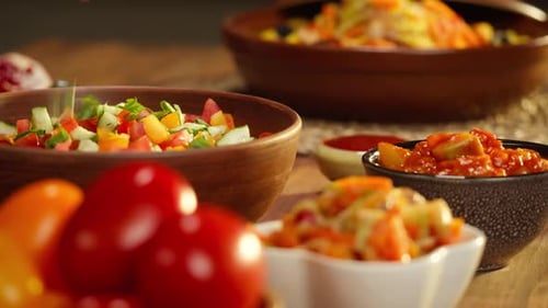 Various Vegetarian Dishes Displayed on Wooden Table