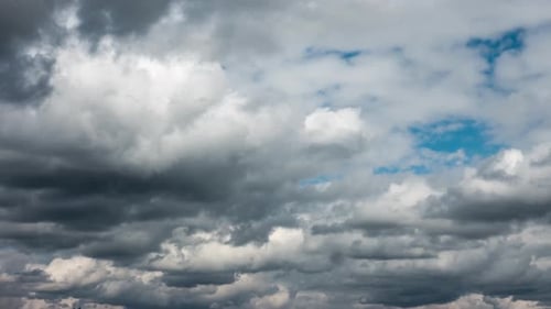 Dramatic Clouds Flowing across Blue Sky Timelapse