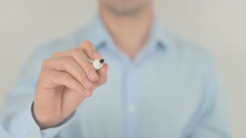 Hand Writes the Word Final on Transparent Surface