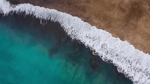 Top View of the Desert Beach on the Atlantic Ocean. Coast of the Island of Tenerife. Aerial Drone