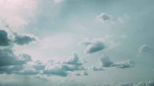 Cloudy Sky With Fluffy Clouds