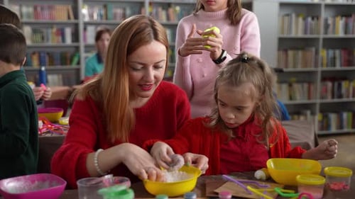 Children Making Slime at a Table with an Adult