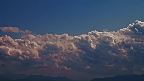 Dramatic Clouds Time Lapse Over Mountain Range