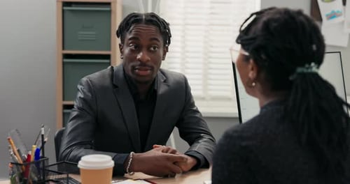 Smiling Corporate Executive Conducts Job Interview with Male Candidate for Office Worker Accepts Him