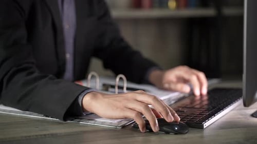 young businessman wearing suit working in business marketing work on computer laptop in home office