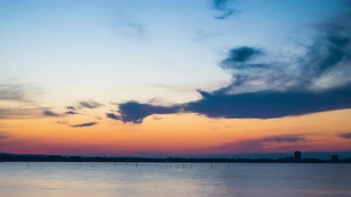 View of the Reflection in the Black Sea Against the Background of the Sky and Sunset
