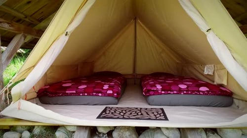 Tracking shot of tent in an eco camping in Slovenia.