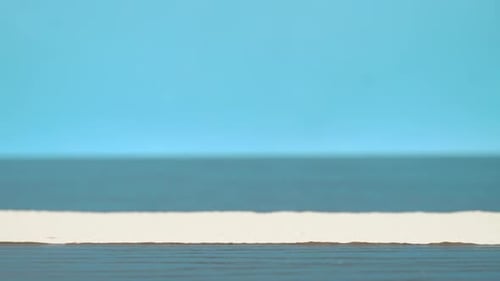 Toilet Paper Roll Rolling on Brown Surface