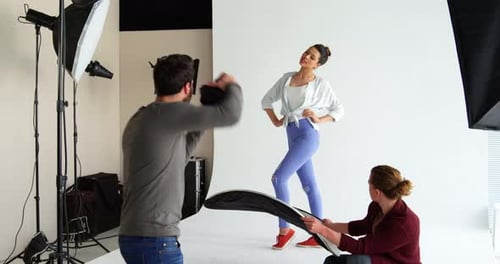 Model Posing in Fashion Photoshoot With Photographer