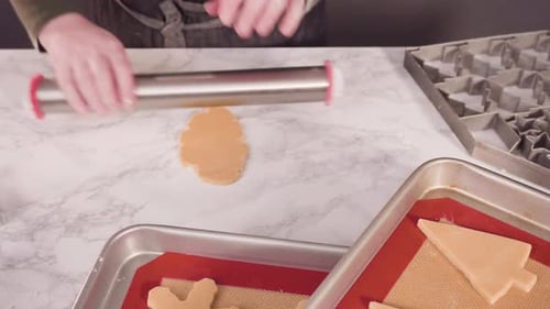 Preparing Christmas Cookies with Cookie Cutters