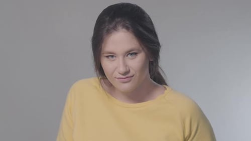 Young Adult Woman Smiling in Close-Up
