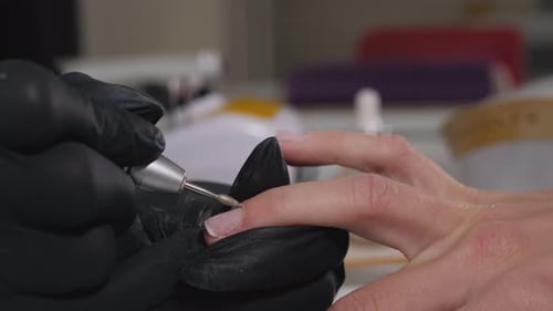 Close Up Manicure Process with Electric File