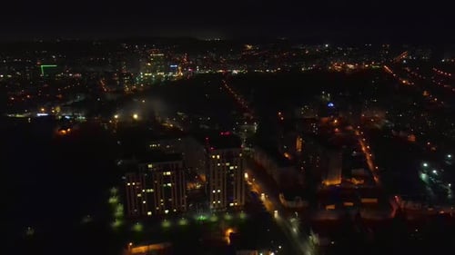 Flight Over the Night City and the House That Glows at Night