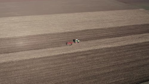 Aerial View of Tractor on Rural Field