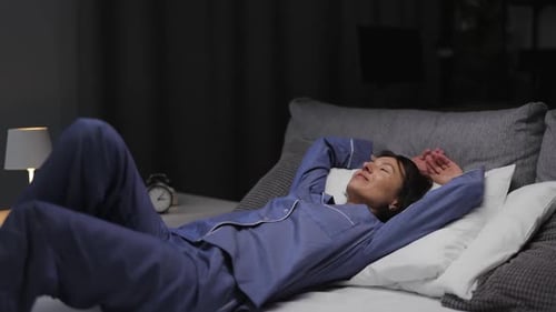 Happy Woman Going to Sleep