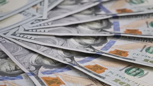 Stacks of One Hundred Dollar Bills Close Up