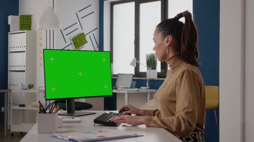 Business Woman Using Computer with Green Screen