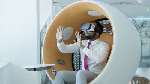 Concentrated Man in Virtual Reality Headset