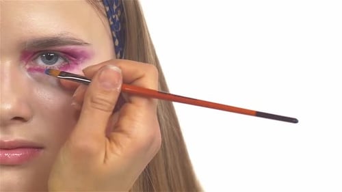 Eye Make-up Woman Applying Eyeshadow, Making Exotic, One Eyes, Blue Eyebrow, Close Up, on White