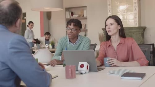 Business Meeting in Modern Urban Workplace