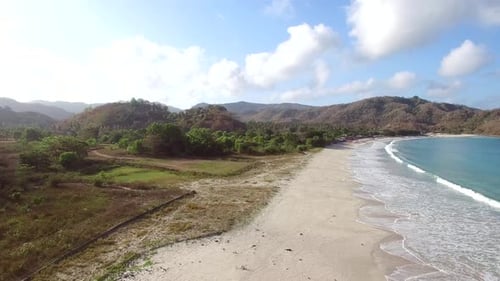 Aerial view of a tropical and isolated beach, Lombok, Indonesia.