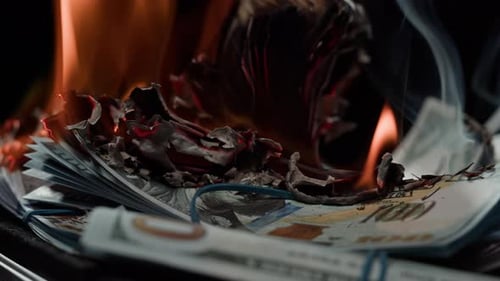 Brennende amerikanische Hundert-Dollar-Banknoten Flamme of Fire aus Geld