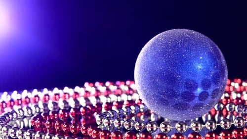 Shiny Blue Toy for Christmas or New Year and Beads, Rotation, on Black, Back Light, Close Up