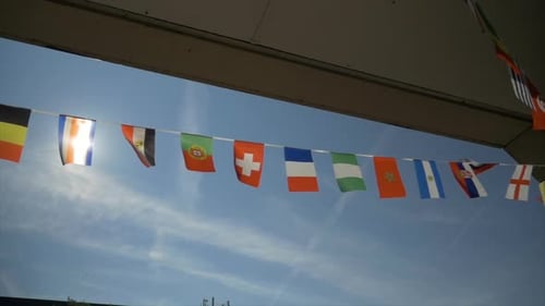 International Flags Blowing Gently on a String
