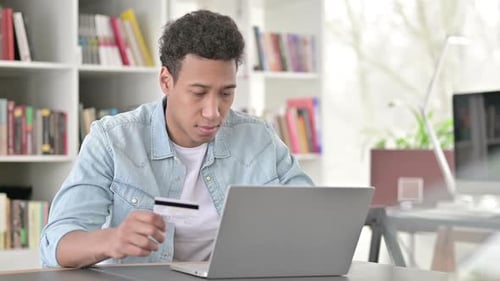 Man Using Credit Card Online