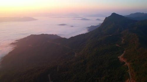 Flying over the clouds during morning sunrise. wonderful morning sunrise natural Landscape.