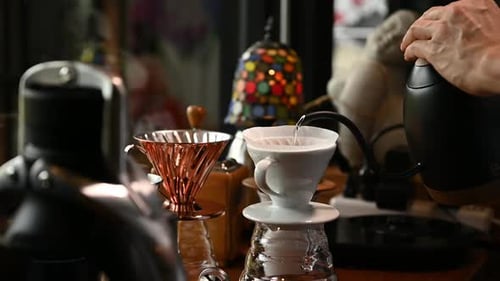 Pouring Hot Water Into Coffee Filter