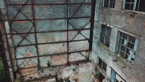 Flight over the destroyed factory. Old industrial building for demolition.