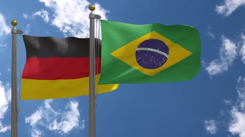 National Flags of Germany and Brazil Waving in the Sky