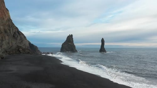 Drone Over Sea And Black Sand Beach