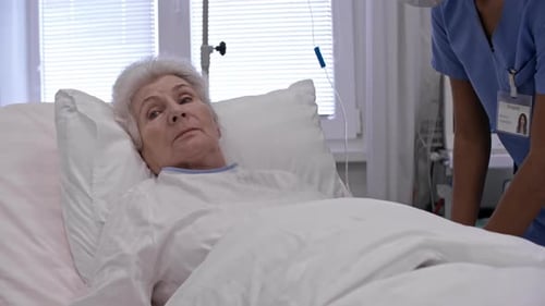 Nurse Treating a Patient