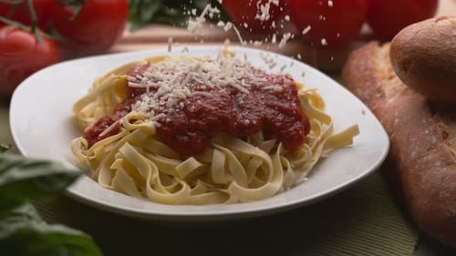 Pasta With Tomato Sauce and Falling Cheese