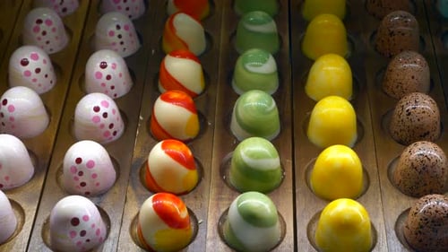 Assortment of Multi Colored Chocolates Candy on the Shop Window