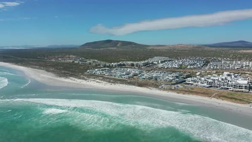 CAPE TOWN SOUTH AFRICA Aerial Moving Along the Shoreline of Big Bay Cape Town South Africa