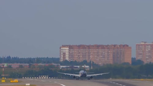 Passenger Plane Taking Off from an Airport Runway