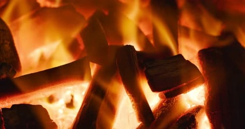 Burning Charcoal Creates Dynamic Fire with Bright Flames