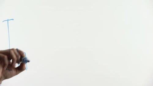 Hand Writes Word "Inspiration" on White Board