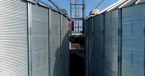 Silver grain elevators outdoors